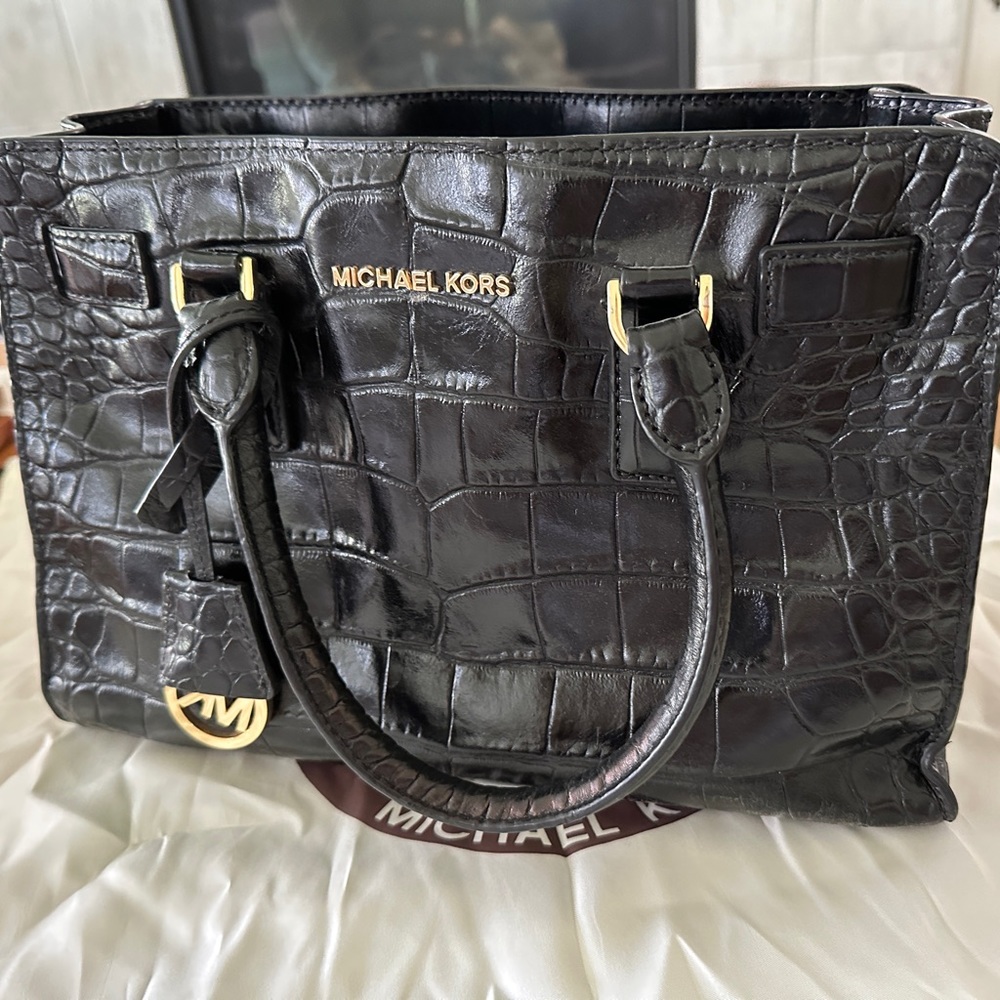 Like new, Michael Kors prse. Black leather.